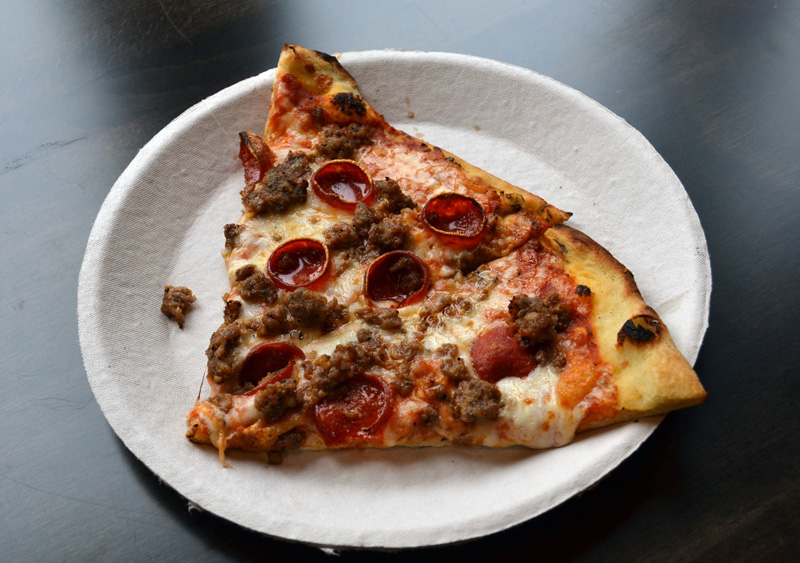 Slices of meat pie pizza at Oysterhead Pizza Co. in Damariscotta. (Maia Zewert photo)