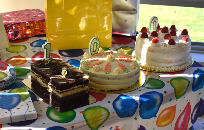 Three birthday cakes, each in the shape of one of the numerals in 100, at Marion Griffin's 100th birthday party at Waldoboro Green. (Alexander Violo photo)