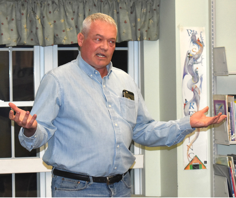 Tim Wells talks about his plans for the A.D. Gray property during a public meeting at the Waldoboro Public Library. The first phase of the project would convert the former school into 20-27 housing units. (Alexander Violo photo)