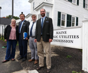 At the Public Utilities Commission headquarters in Hallowell: (from left) Rep. Charlotte Warren, Rep. Jeffrey Evangelos, Rep. Thom Harnett, and Rep. William Pluecker.