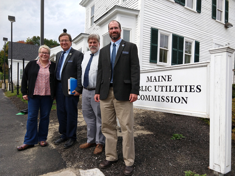 At the Public Utilities Commission headquarters in Hallowell: (from left) Rep. Charlotte Warren, Rep. Jeffrey Evangelos, Rep. Thom Harnett, and Rep. William Pluecker.