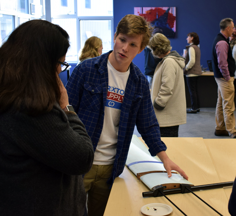 Lincoln Academy student Toby Seidel explains his plans for a lightweight drone during the first Project Share Day at Lincoln Academy in Newcastle on Monday, Nov. 4. (Evan Houk photo)