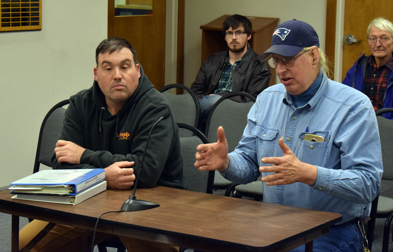 Hagar Enterprises Inc. co-owner Seth Hagar (left) and Damariscotta Road Commissioner Hugh Priebe address Pleasant Street residents' concerns about salt use during a meeting of the Damariscotta Board of Selectmen on Wednesday, Dec. 18. (Evan Houk photo)