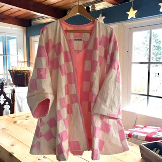 This artful quilt coat created by textile artist Jody Halliday had its humble beginnings as a cast-off stained quilt in a $3 bag of Damariscotta rummage sale items. (Photo courtesy Mary Lavandier Myers)