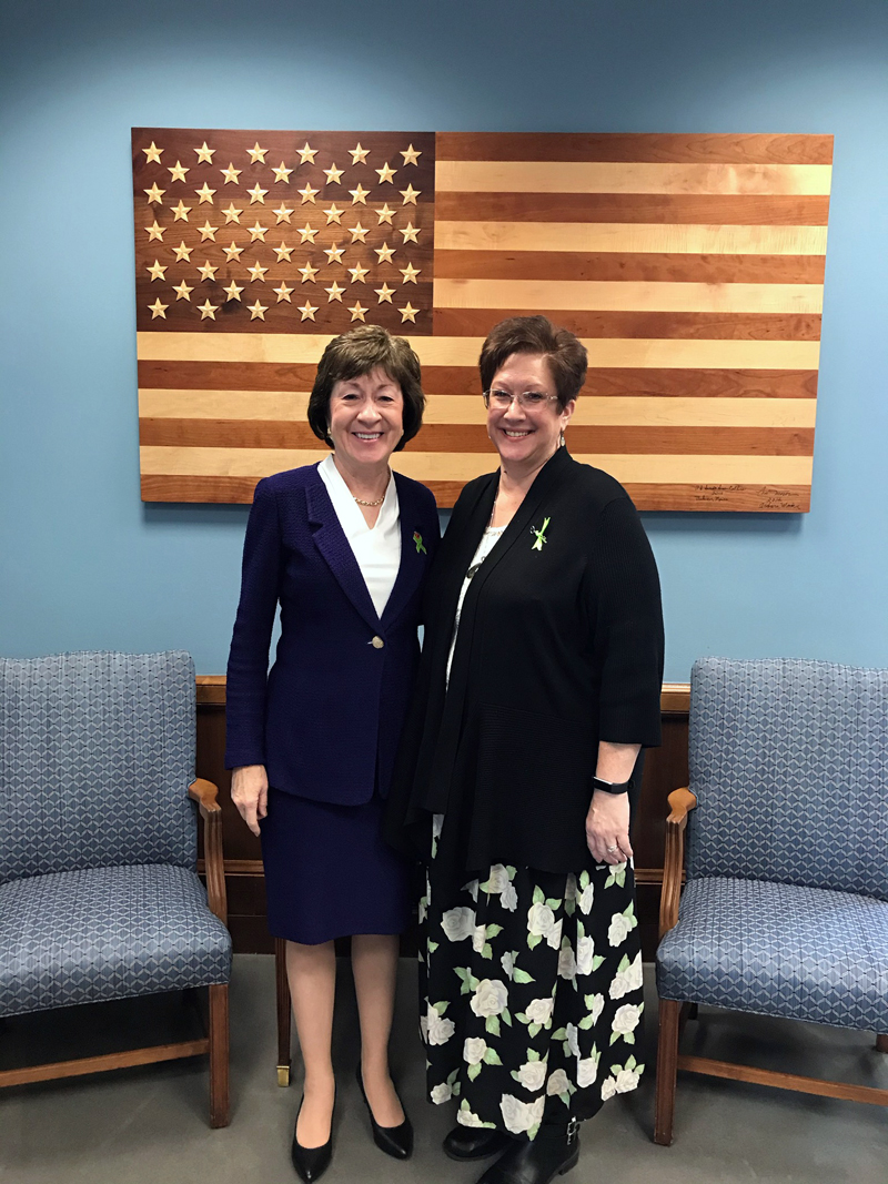 Paula Jackson Jones, of Nobleboro, poses for a photo with U.S. Sen. Susan Collins in her Washington, D.C. office in October. Jones was in D.C. to support the Kay Hagan Tick Act. (Photo courtesy Paula Jackson Jones)