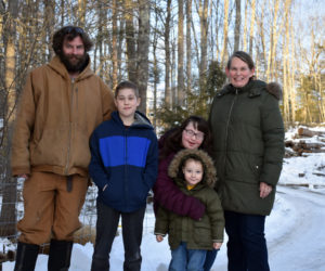 The Sturtevant family at their Switchback Farm in Nobleboro. From left: Matthew, Elijah, Harper, Bronson, and Maisie. (Alexander Violo photo)