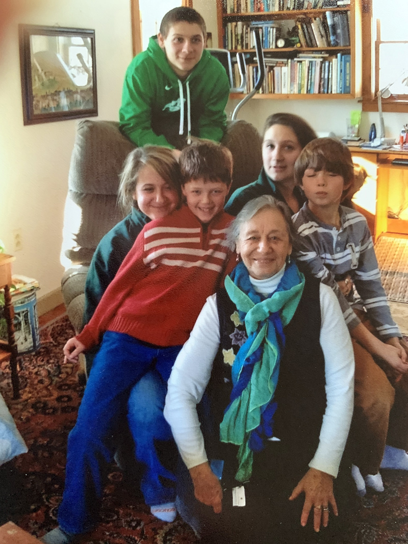 Millie Sabatine relaxes with her five grandchildren: Kaleb Bridgham (back) and (from left) Kelsea Bridgham, Henry Sabatine, Kate Bridgham, and Sam Sabatine. (Photo courtesy Lisa Sabatine)