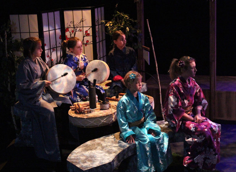 Musicians and narrators keep the traditional Japanese theater-style at Heartwood Regional Theater Company's production this weekend: (back row from left) Lilah Drewes, Eve Allen, and Caroline Allan; and (front row from left) Josie Branson and Ashley Nixon. Missing from the photo is Violet Holbrook. (Photo courtesy Griff Braley)