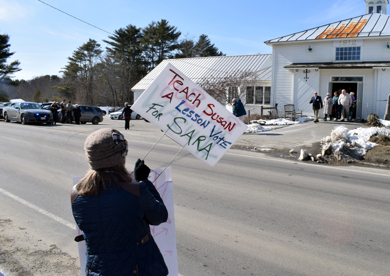 A protester yells to attendees as the exit the Lincoln County Republican Committee's annual Lincoln Day event at The 1812 Farm in Bristol Mills on Saturday, Feb. 22. (Evan Houk photo)