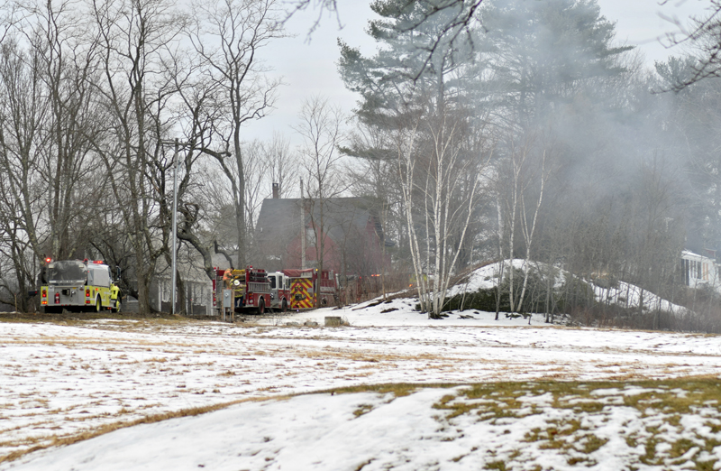 Smoke rises from a kitchen fire at a home in Newcastle's Sheepscot village the afternoon of Wednesday, Feb. 26. The fire was quickly knocked down, according to Newcastle Deputy Fire Chief Casey Stevens. (Evan Houk photo)