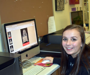 Shyla Waltz, a sophomore at Medomak Valley High School, works on #WhyYouMatter photos on the computer in the school's art room. (Alexander Violo photo)
