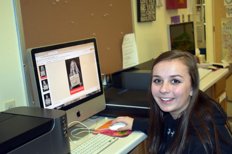Shyla Waltz, a sophomore at Medomak Valley High School, works on #WhyYouMatter photos on the computer in the school's art room. (Alexander Violo photo)