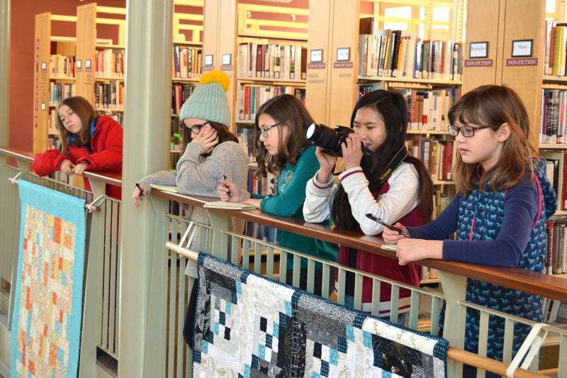 The 2020 Junior Journalists watch the STEAM-uary egg drop. From left: Aja Chung, Lauren Lee, Sofia Michaud, YuJi Smith, and Sarah Vallance. (Maia Zewert photo)