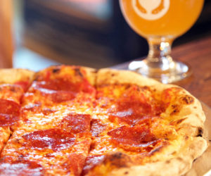 Twelve-inch wood-fired pepperoni pizzas are on the menu at Odd Alewives Farm Brewery.