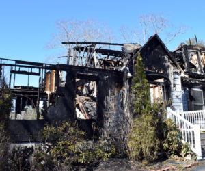 The remains of a house at 30 Sunny Acres Lane in Boothbay after a fire early Thursday, March 5. The residents were able to exit safely, but a dog and two cats died. (Evan Houk photo)