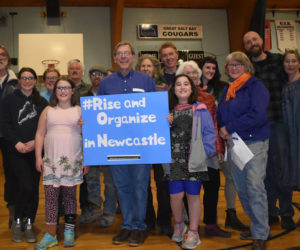 Democratic caucus goers from Newcastle pose for a photo after their caucus at Great Salt Bay Community School in Damariscotta on Sunday, March 8. (Alexander Violo photo)