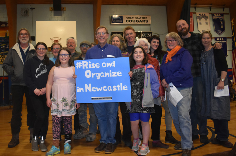 Democratic caucus goers from Newcastle pose for a photo after their caucus at Great Salt Bay Community School in Damariscotta on Sunday, March 8. (Alexander Violo photo)