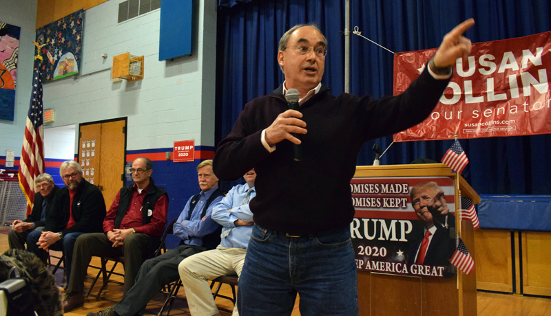 Bruce Poliquin, former representative of Maine's 2nd Congressional District, gives a speech as local legislative candidates look on during a Republican caucus at Great Salt Bay Community School in Damariscotta on Saturday, Feb. 29. (Evan Houk photo)