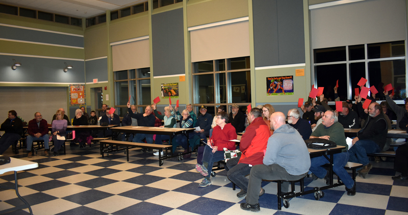 Jefferson residents vote down a moratorium on new gravel pits and expansions of existing gravel pits during a special town meeting at Jefferson Village School on Monday, March 2. (Alexander Violo photo)