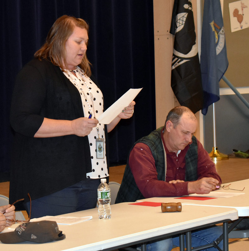 Jefferson Selectman Pamela Grotton moderates a special town meeting at Jefferson Village School on Monday, March 2, as Selectman Gregory Johnston looks on. (Alexander Violo photo)