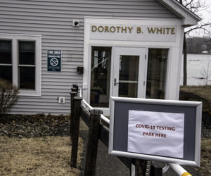 A sign directs people to park in front of the Dorothy B. White building, on LincolnHealth's Miles Campus in Damariscotta, for COVID-19 testing, Tuesday, March 17. The hospital will only test patients on a doctor's orders. (Bisi Cameron photo)