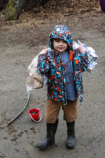 Otto Dumas, 4, receives a meal delivery in Whitefield on Friday, March 20. RSU 12 marshaled adminstrators, teachers, and support staff to deliver food to 98 schoolchildren in the Somerville-based district. (Bisi Cameron photo)