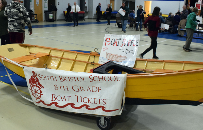 South Bristol School eighth graders raffled off a boat built by the class of 2019 at annual town meeting Tuesday, March 10. David Poland won the boat. (Evan Houk photo)