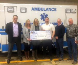 From left: First National Bank Senior Vice President/Senior Regional Business Relationship OfficerTodd Savage, Branch Manager Jessica Day, Vice President/Regional Manager Michelle Curtis, Central Lincoln County Ambulance Service Chief Nicholas Bryant, First National Bank President and CEO Tony McKim, and South Bristol Board representative Alden McFarland.