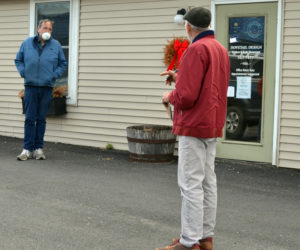 Coastal Cannabis Co. LLC co-owner Dave Page (left) tells Damariscotta Town Planner Bob Faunce about his plans for the business during a site walk at 53A Chapman St. the evening of Monday, April 20. (Maia Zewert photo)
