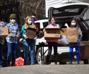 Volunteers staff a pop-up food pantry at South Somerville Baptist Church on Thursday, April 16. The Jefferson Area Community Food Pantry organized the event. (Alexander Violo photo)