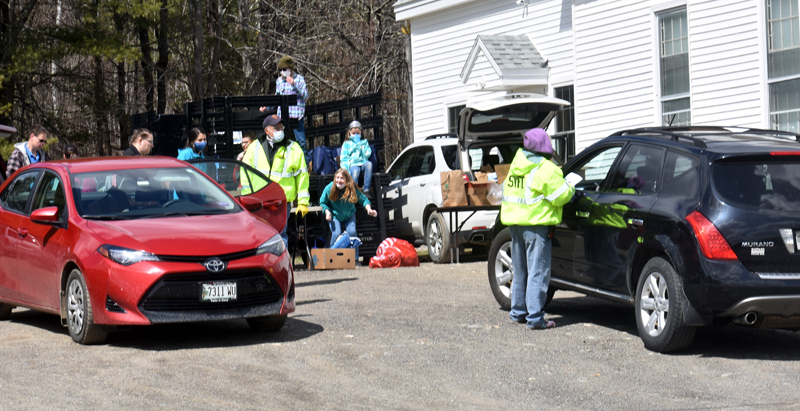 Somerville firefighters distribute food at a pop-up pantry Thursday, April 16. (Alexander Violo photo)