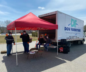 Volunteers staff a drive-thru food pantry at the Waldoboro municipal building Tuesday, April 21. Organizers plan to hold the events weekly throughout the state of emergency. (Photo courtesy Julie Keizer)