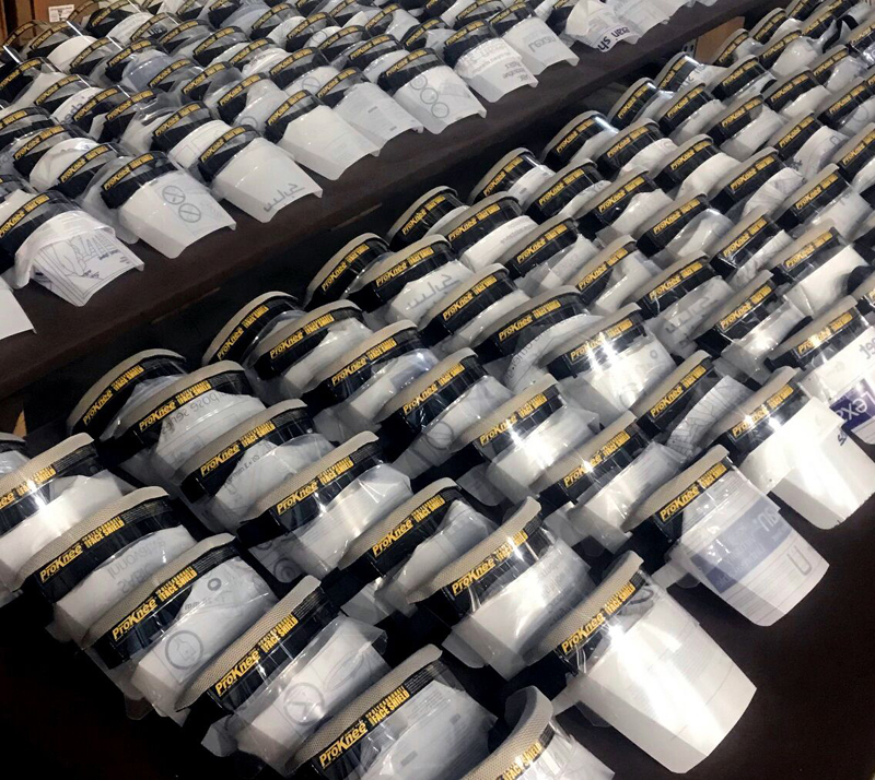 ProKnee face shields await shipment at the manufacturer's facility in Whitefield. (Photo courtesy Jordan Richards/ProKnee)