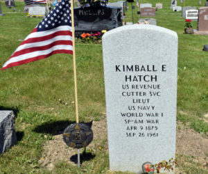 An American flag and a World War I medallion decorate the grave of Lt. Kimball Edward Hatch in Hillside Cemetery, Damariscotta. Local researchers identified Hatch and arranged for a new headstone after learning of his unmarked grave. (Evan Houk photo)