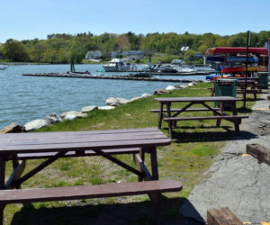 Picnic tables are available for outdoor dining along the Damariscotta waterfront. The town of Damariscotta provided the picnic tables in response to a request from downtown business owners and is considering their request for an open-air market. (Evan Houk photo)