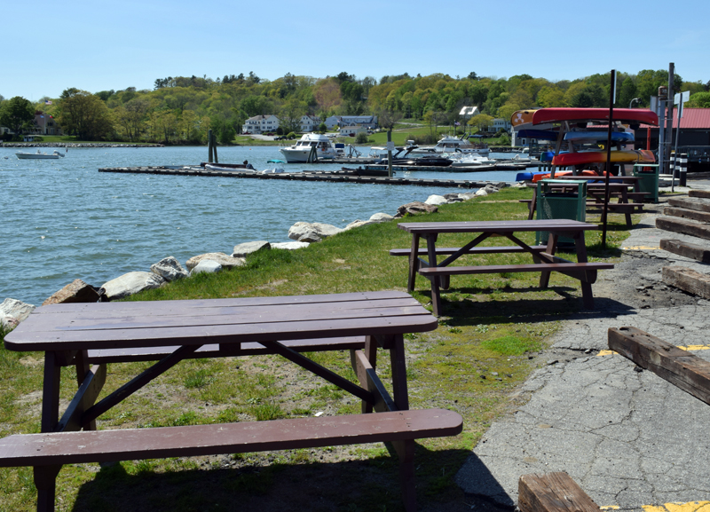 Picnic tables are available for outdoor dining along the Damariscotta waterfront. The town of Damariscotta provided the picnic tables in response to a request from downtown business owners and is considering their request for an open-air market. (Evan Houk photo)