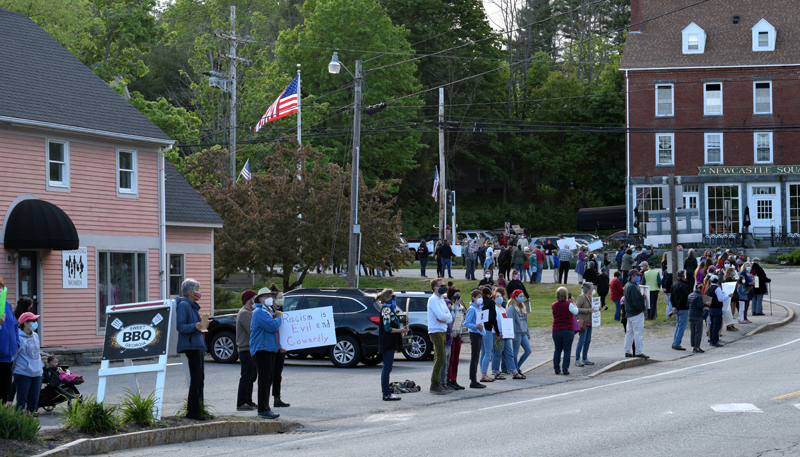 Protesters line the sidewalk around Veterans Memorial Park in Newcastle on Monday, June 1. The silent demonstration was in support of Black Lives Matter protests around the country. (Hailey Bryant photo)