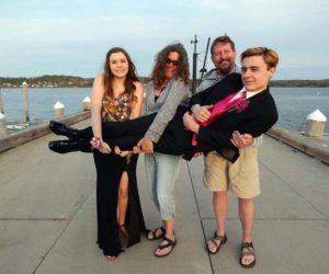 Connor McLean poses for a photo with his family on the occasion of his senior prom in 2019. From left: sister Maddie McLean, mom Elizabeth MacKenney, and stepfather Scott MacKenney. (Photo courtesy Elizabeth MacKenney)