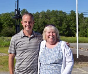 Josh Chase congratulates longtime Whitefield Elementary School teacher Gail Beck on her retirement during a celebration outside the school Friday, June 19. Chase was a student in Beck's first class at Whitefield Elementary, 38 years ago, and drove from Portland to wish her well. (Hailey Bryant photo)