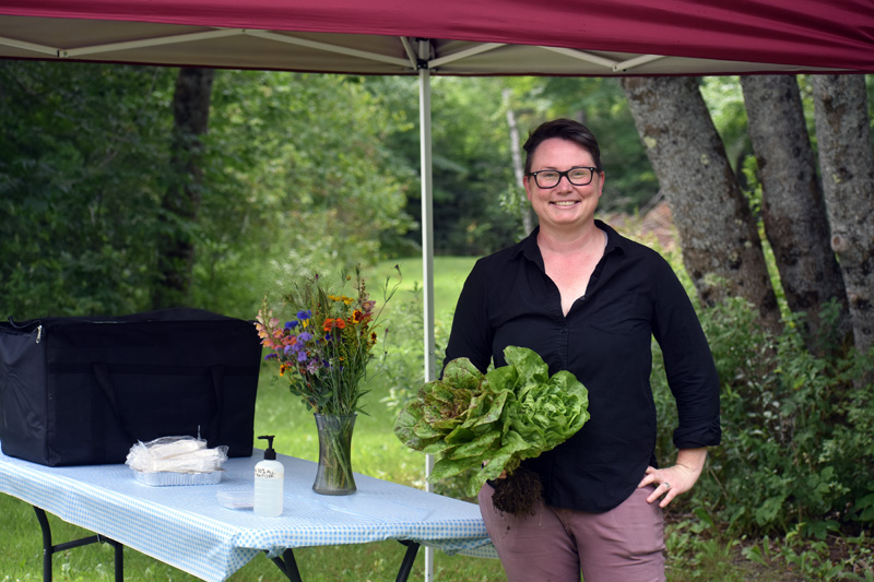 Morgan Bleimeyer, owner and chef at Red Stove Farm & Provisions, by the takeout station at her new business in Jefferson. (Alexander Violo photo)