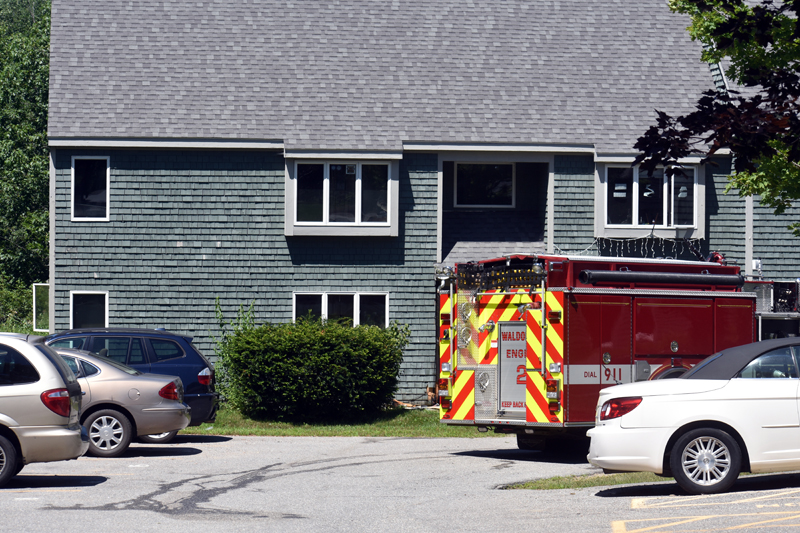 A Waldoboro fire truck stands by at Waldoborough Village Apartments on Wednesday, July 29. (Alexander Violo photo)