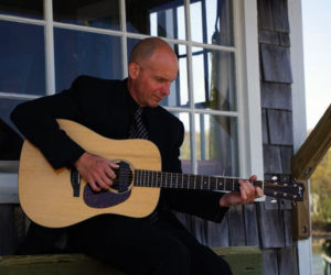 Seth Warner plays acoustic guitar.