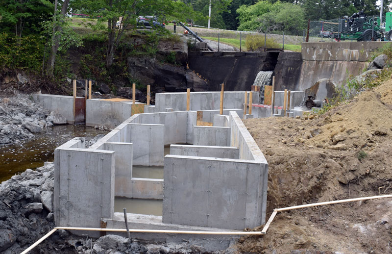 A view of the progress on the new fish ladder below the Bristol Mills Dam on Monday, Aug. 10. Mark Becker, of Nobleboro's Becker Construction Inc., said 14 more concrete pools have to be installed and stonework has to be done to complete the ladder by the beginning of winter. (Evan Houk photo)