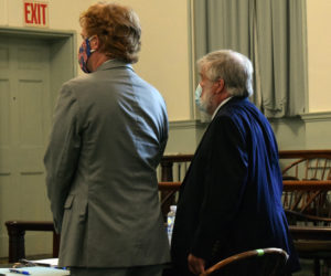 Defense attorney James Mason (left) stands with his client, disbarred attorney Jonathan Hull, of Newcastle, during Hull's sentencing for his embezzlement of funds from two nonprofits, at the Lincoln County Courthouse in Wiscasset on Tuesday, Aug. 25. (Evan Houk photo)