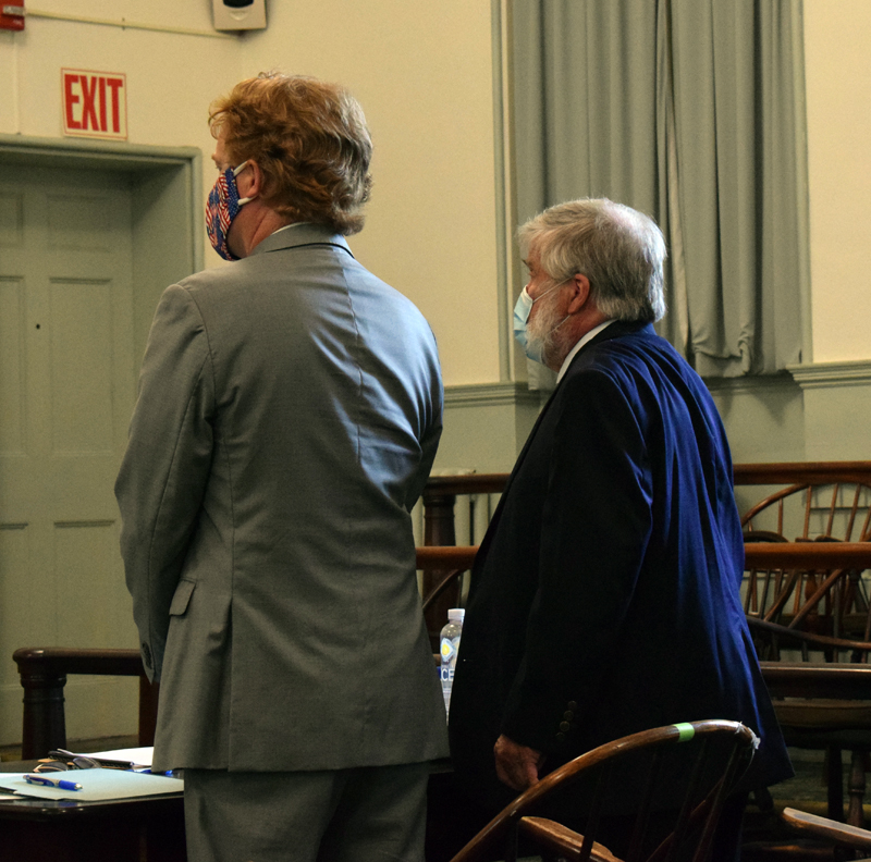 Defense attorney James Mason (left) stands with his client, disbarred attorney Jonathan Hull, of Newcastle, during Hull's sentencing for his embezzlement of funds from two nonprofits, at the Lincoln County Courthouse in Wiscasset on Tuesday, Aug. 25. (Evan Houk photo)