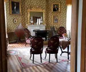 Views into preserved rooms at Castle Tucker provide a glimpse into history.