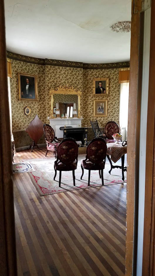Views into preserved rooms at Castle Tucker provide a glimpse into history.