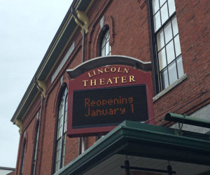 Lincoln Theater's Main Street marquee announces its reopening.