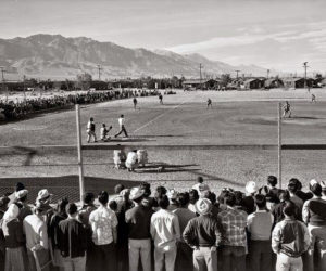 Baseball lifted spirits at Japanese internment camps during World War II, as shown in this photo by Ansel Adams.