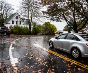 Vehicles navigate the intersection of Huddle Road and Snowball Hill Road in Pemaquid Beach village, Tuesday, Oct. 13. Village residents want changes in the area to address concerns about pedestrian and traffic safety. (Bisi Cameron Yee photo)
